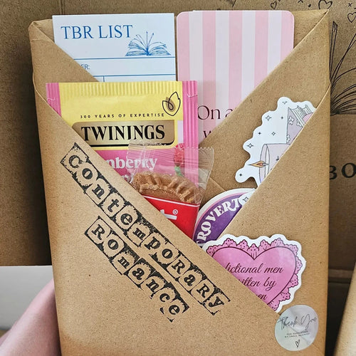"Blind date with a book gift — contemporary romance wrap with Twinings tea, biscuit, bookish stickers and TBR list card"