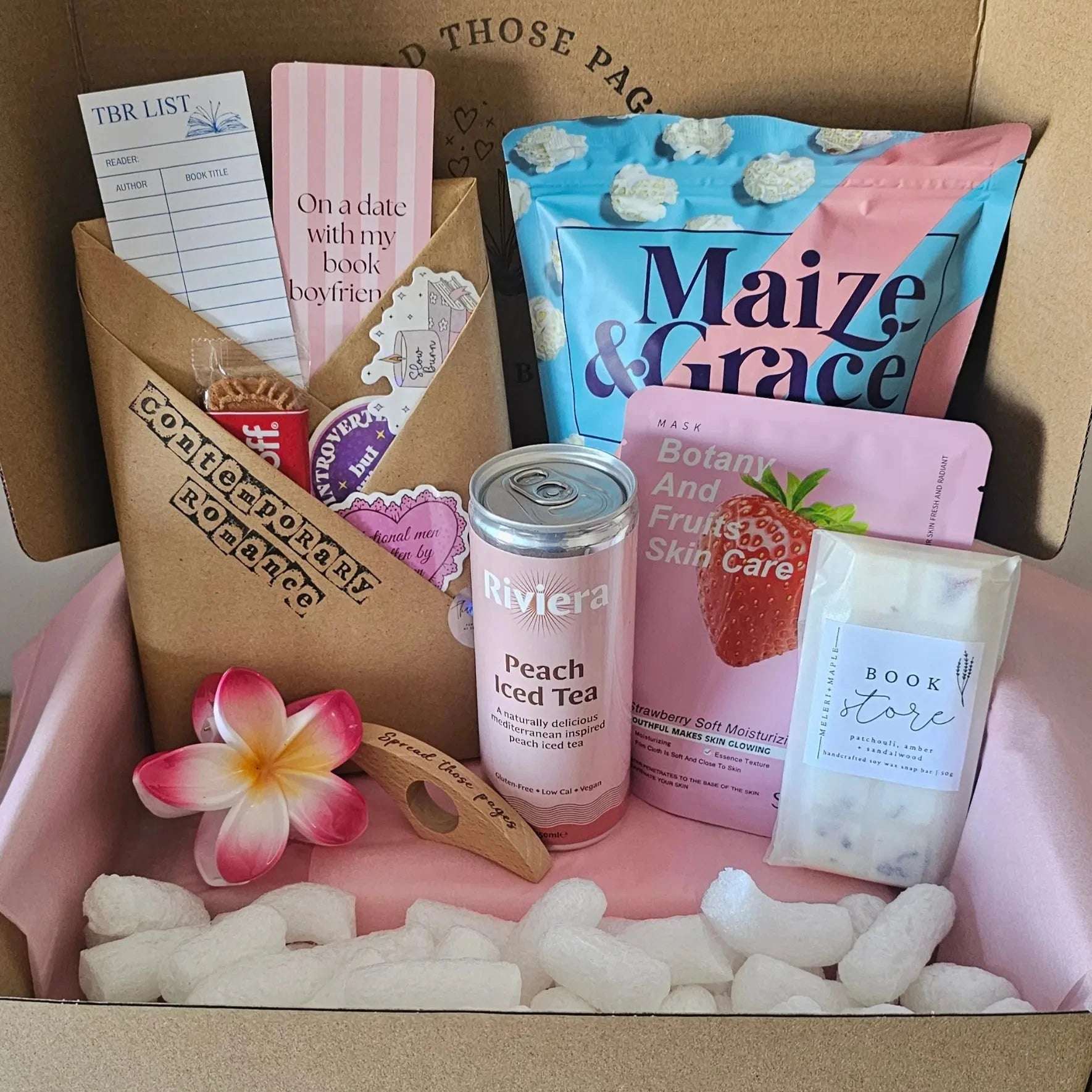Luxury romance night in book box gift with blind date book, bookmarks, wax melts, popcorn and iced tea
