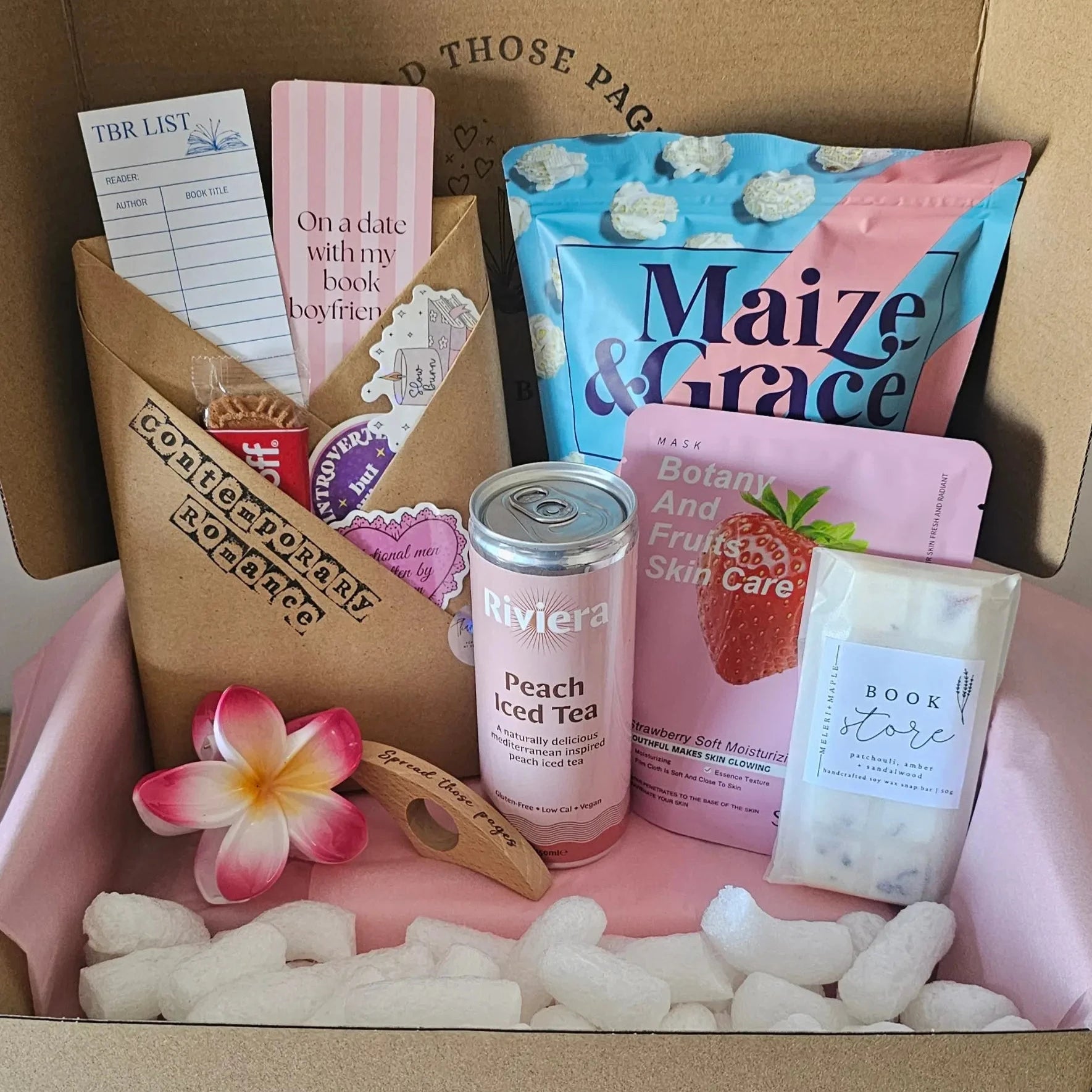 Luxury romance night in book box gift with blind date book, bookmarks, wax melts, popcorn and iced tea