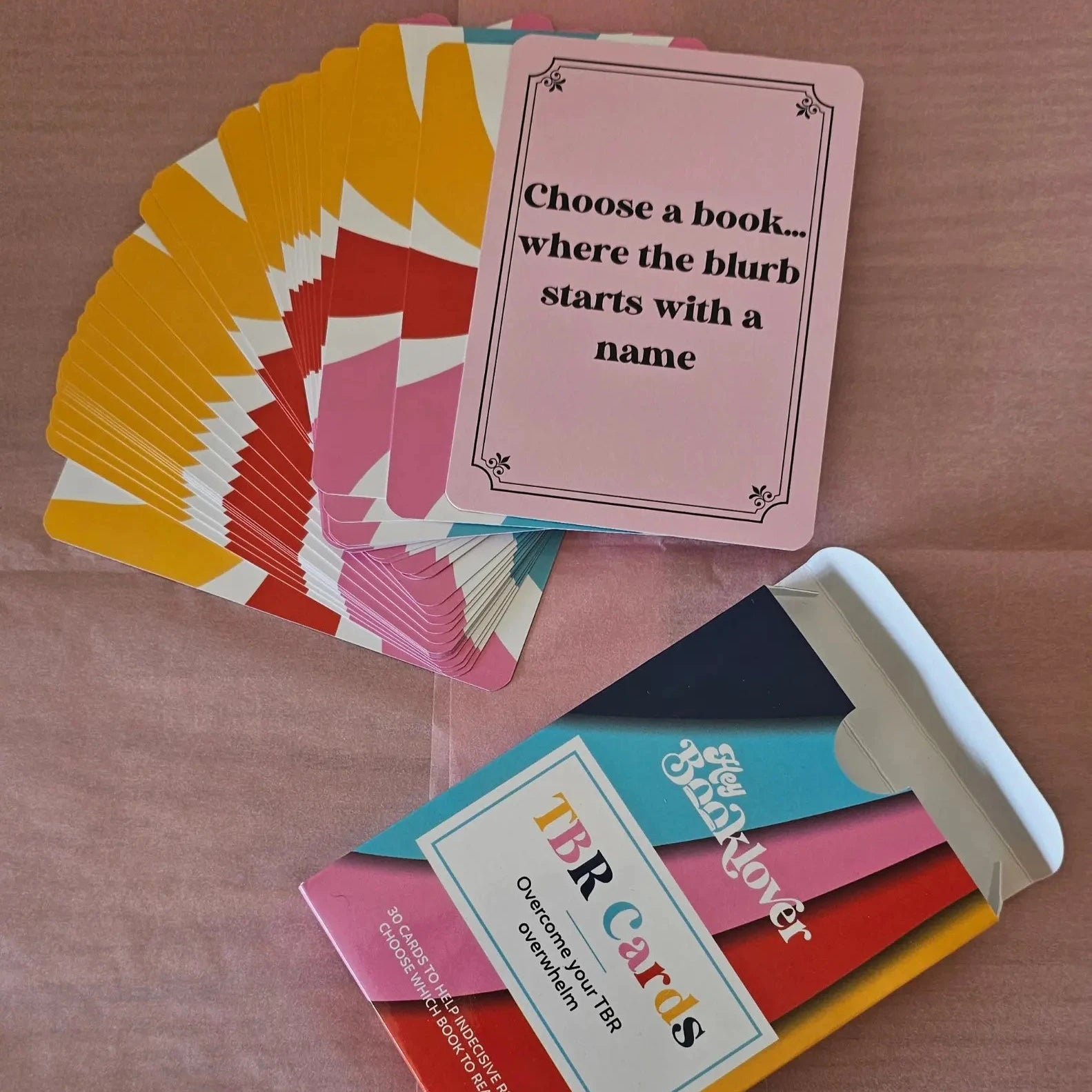 TBR Cards — 30 bookish prompt cards to help you choose what to read next, fanned out with colourful packaging"